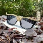 buy-blue-haired-woman-with-lion-head-sunglasses-online-wild-738