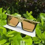 buy-blue-haired-woman-with-lion-head-sunglasses-online-wild-738