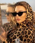 Woman with Sunglasses, Hat and Scarf